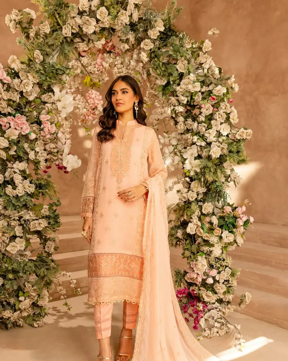 Peach embroidered pret kameez with a matching dupatta